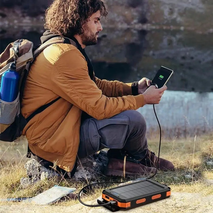 Image of 10000mAh Solar-Powered Portable Power Bank with Flashlight-Item# 12620  NationwideSafes.com